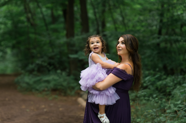 I was thrilled when Michelle from Pink Comb Studio reached out for her maternity photos. Following COVID-19 rule, keeping social distance I photographed Michelle and her two beautiful girls at Watchung Mountain NJ. With overcast weather three trees and grass showed such a rich deep green colors. I love bold rich colors in my photos as much as I love sunset golden hour. Michelle was just glowing and looked so beautiful. Was so happy to have such a beautiful mama in front of my camera before Michelle becomes mama of three girls. I can not wait to see her new baby girl and see her family grow. Michelle Surgent’s maternity session captured by Karis from heykaris.